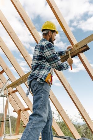 construction-worker-with-hard-hat-building-roof-house